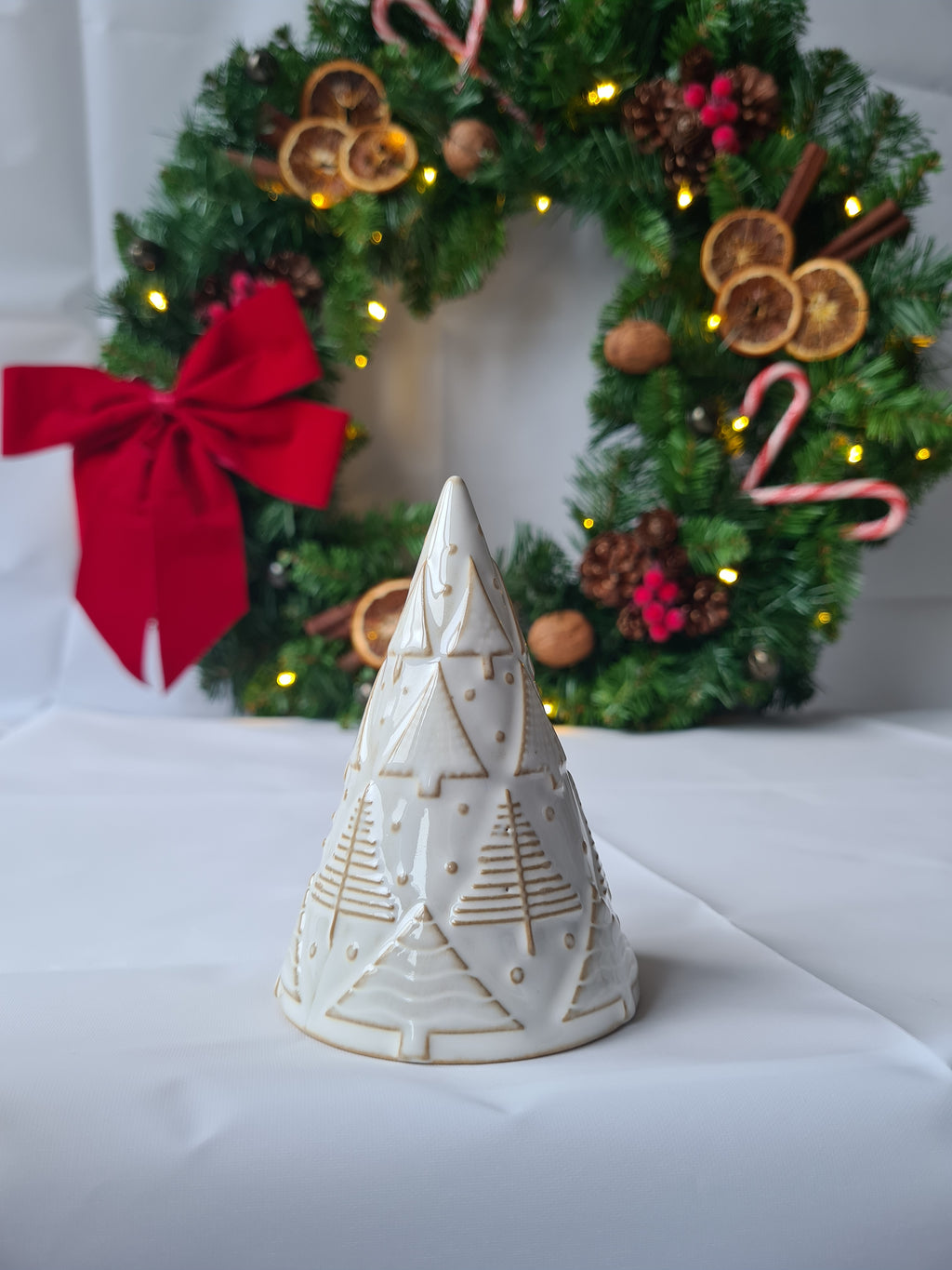 White Reactive Glaze Ceramic Christmas Tree Ornament adorned with hand finished Embossed Festive Trees