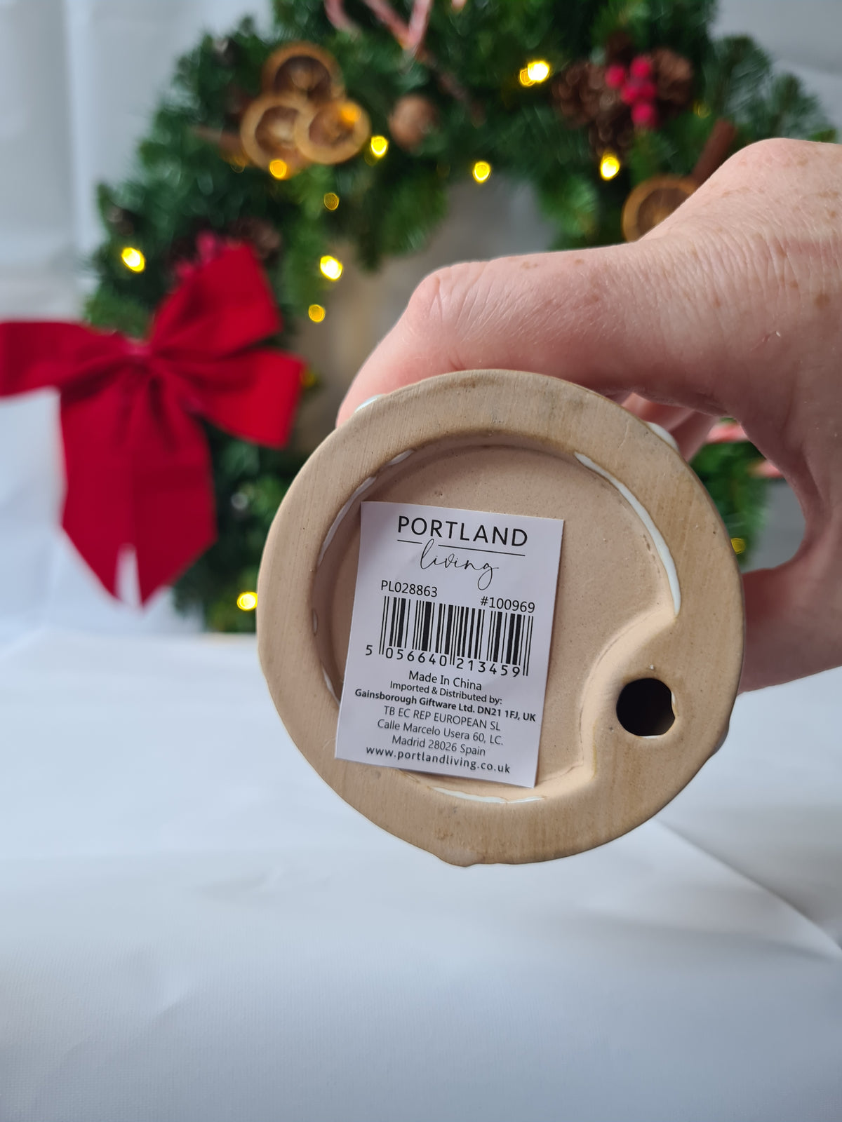 White Reactive Glaze Ceramic Christmas Tree Ornament adorned with hand finished Embossed Festive Trees