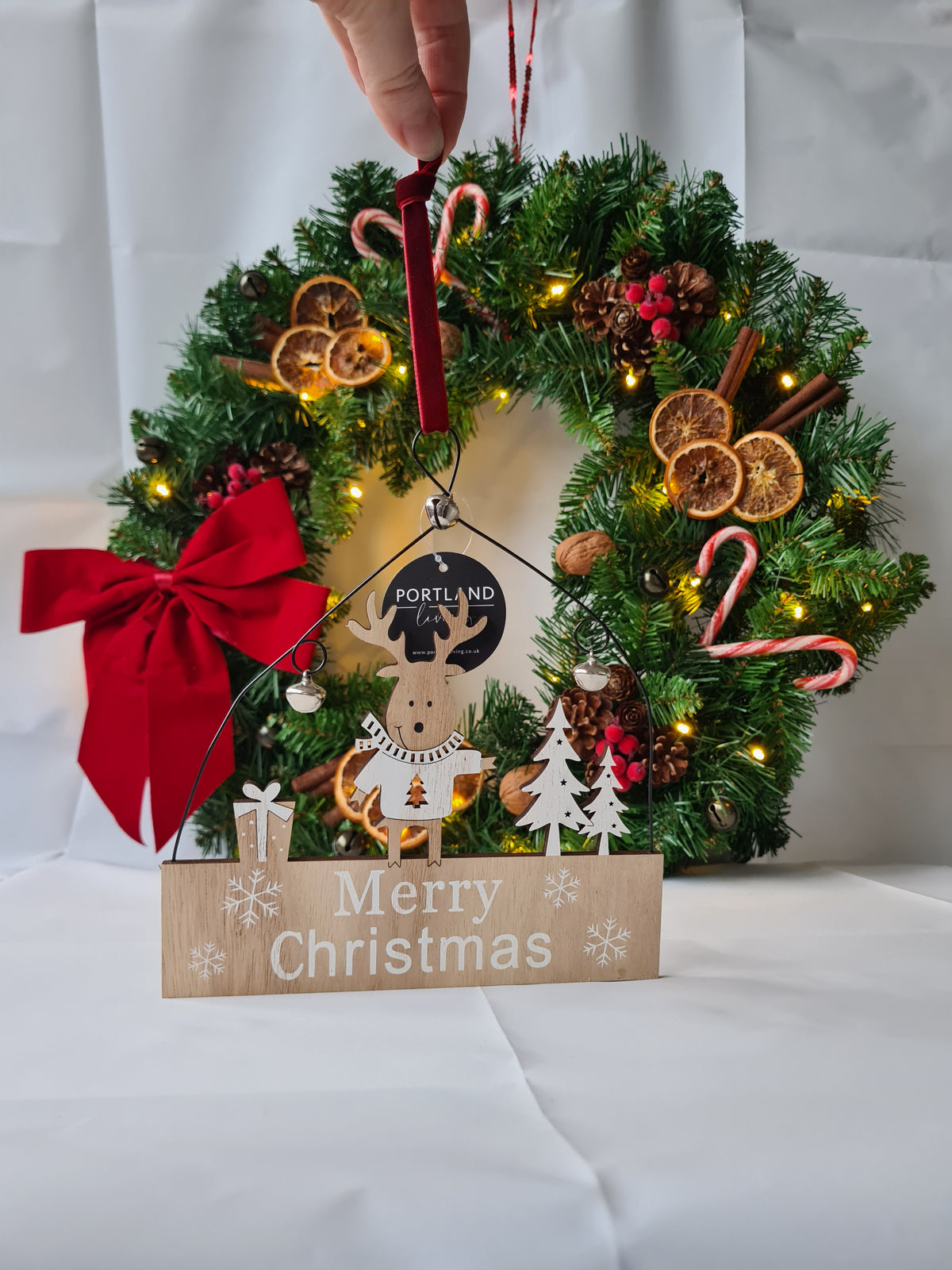 Rustic Wooden Reindeer "Merry Christmas" Hanging Sign with Red Velvet Ribbon and jingle bells